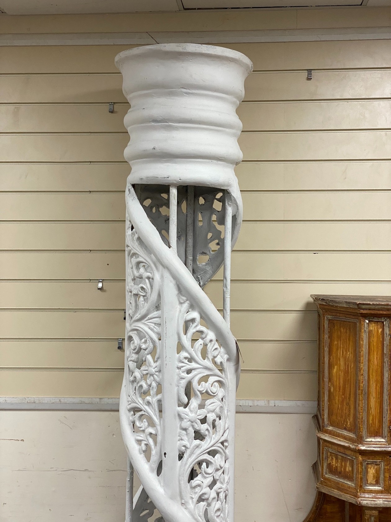 A pair of large white painted fibre glass helical columns, height 239cm